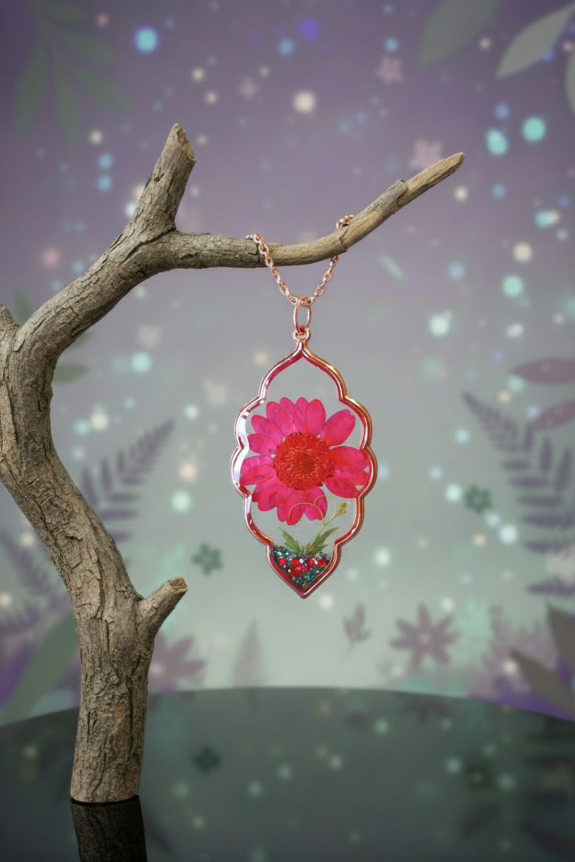 Pink flower necklace on branch