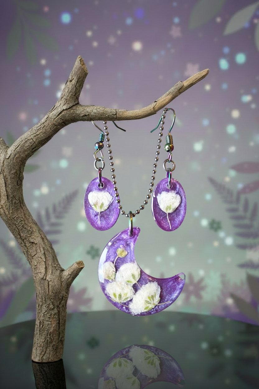 Purple resin jewelry set on mystical branch