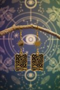 Star tarot earrings on branch