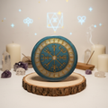 Teal and gold Vegvisir compass with log background